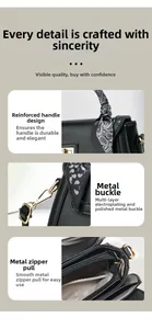 Detail of reinforced handle with paisley scarf and polished gold hardware on black handbag