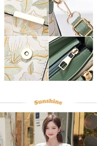 Détail de broderie florale et ferrures dorées sur un sac à main en cuir vert