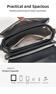 Detail view of the black leather crossbody bag interior with multiple zip compartments