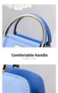 Detail of light blue patent leather bag with quilted pattern and metal handle