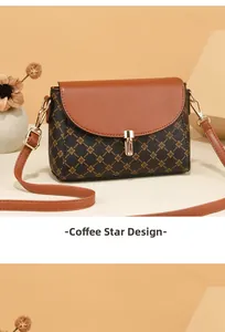 Detail of coffee star pattern handbag with vintage golden metal rotating lock and brown flap
