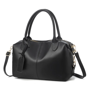 Classic black leather handbag with gold hardware and dual handles for middle-aged women