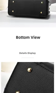 Detailed macro view of black lychee leather bag base with four gold protective metal feet