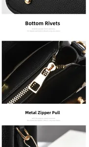 Detail of lychee pattern leather handbag with gold metal feet and sturdy zipper pulls