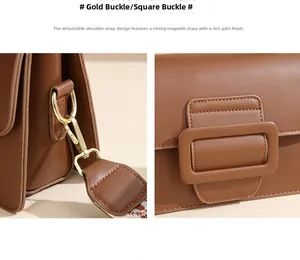 Dettaglio borsa in pelle marrone con chiusura in metallo dorato e gancio a tracolla
