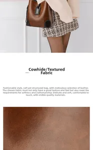 Close-up detail of soft brown cowhide leather texture on a fashion bucket bag