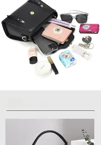 Detailed internal capacity of black litchi grain crossbody bag showing daily essentials