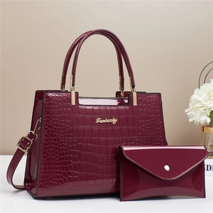 Burgundy faux crocodile leather handbag and wallet set with metallic Danbaoly logo