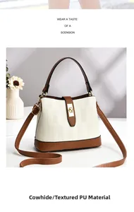 Close-up of high-quality PU leather texture and golden metal lock on the bucket bag