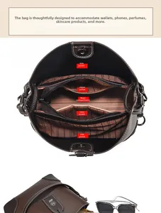 Internal structure of large vintage bucket bag showing multiple storage compartments
