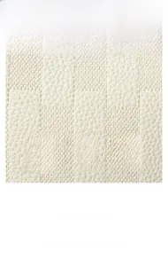 Macro shot of off-white lychee pattern leather showing soft texture and fine grain detail