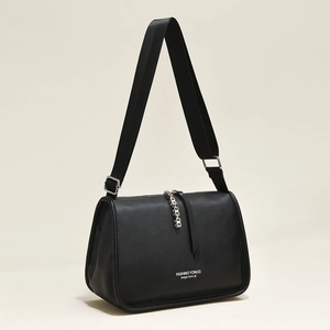 Minimalist black pebble leather handbag with wide nylon strap and silver chain detail