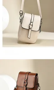 Detailansicht der Mini-Handytaschen in Creme und Braun mit Retro-Metallschnallen