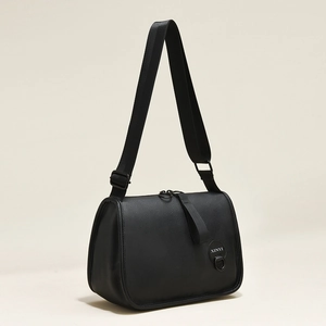 Classic black pebbled leather crossbody bag with wide woven strap and XINYI logo