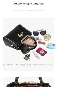 Interior view of black leather handbag showing large capacity for essentials and gold clasp