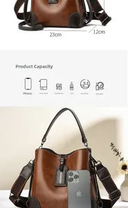 Detail of a brown vintage bucket bag showing 23cm size and large interior capacity