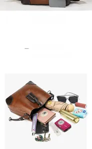 Internal view of brown PU tote showing large capacity for umbrella, camera and wallet