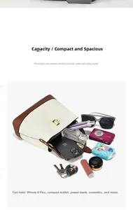 Internal view of cream leather crossbody bag showing large capacity for essentials