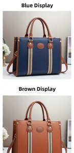 Detail of large tote bag in blue and khaki with lychee grain texture and webbed straps