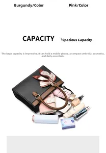 Detailed internal capacity of two-tone leather tote bag showing storage of daily essentials