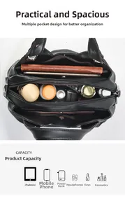 Vue de dessus d'un grand cabas noir avec compartiments pour objets du quotidien