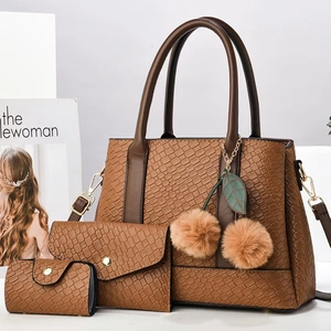 Three-piece brown embossed leather handbag set with woven texture and cherry pendant charm