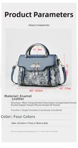 Blue patent leather bag with silver swan ornament and 22.5x11x18cm dimensions