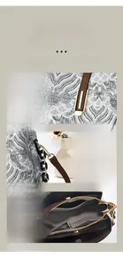 Détail du sac à main rétro à carreaux avec poignée en cuir et ferrures dorées polies