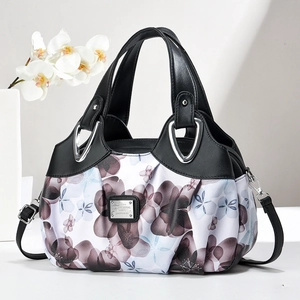 Sac à main Boston pour femme en toile fleurie noire avec longue bandoulière
