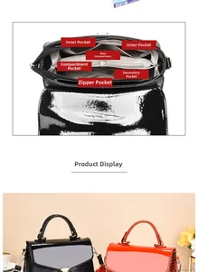 Detailed interior view of a patent leather handbag showing multiple storage pockets and compartments