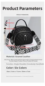 Detail of black quilted patent leather bag with wide geometric strap and dimensions