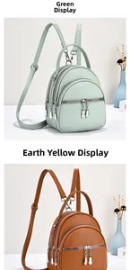 Detail of mini backpacks in green and brown textured PU leather with three zippers