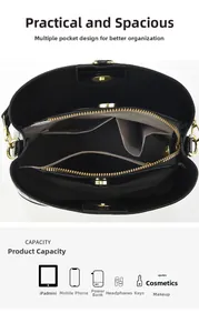 Interior of black faux crocodile bucket bag showing multi-pocket storage and large capacity