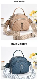 Detail view of khaki and blue quilted crossbody bags with wide patterned straps