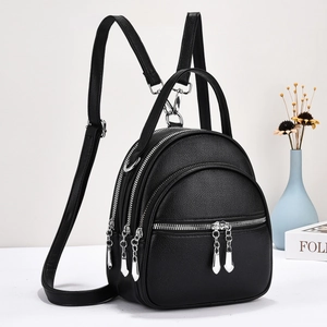 Mini black leather backpack for women with multi-layer silver zippers and top handle