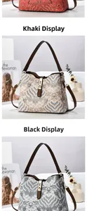 Close-up of retro bucket bags with wave patterns and gold metal twist-lock hardware