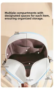 Detail view of the soft leather backpack interior showing multiple pockets and main compartment