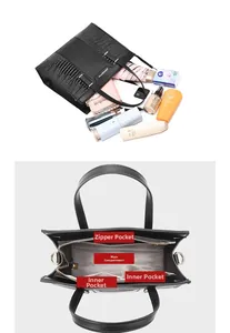 Detail view of the black tote bag interior structure with multiple storage pockets