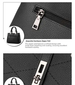 Macro detail of the smooth metal zipper and back pocket on a black litchi leather handbag