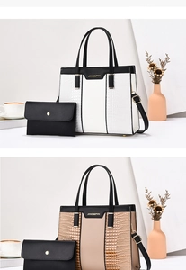 Detail of elegant two-piece handbag set with crocodile pattern and JING&PIN branding