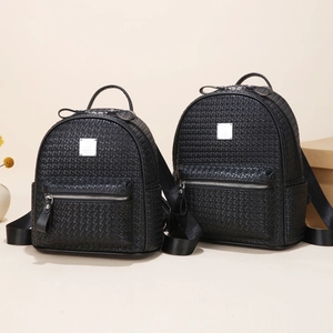 Ensemble de deux sacs à dos noirs à texture tissée avec fermetures éclair argentées