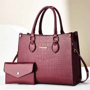 Burgundy faux crocodile leather tote bag set with matching envelope wallet and gold logo