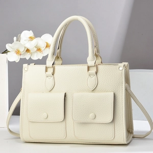 Elegant cream white pebble leather tote bag with dual front pockets and top handles