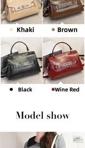 Detail view of glossy leather handbag in khaki, brown, black, and wine red with metal lock