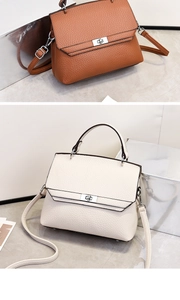Detailansicht der Handtaschen aus Leder in Braun und Beige mit silbernem Drehverschluss