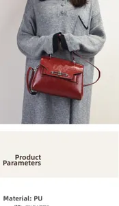 Detail of red PU leather bag with glossy oil wax texture and metal flip lock clasp