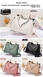 Détails des sacs à main coquille avec dimensions 26x12x18cm et poignées métalliques
