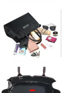 Spacious interior of a black leather tote showing large capacity for daily essentials