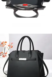 Detail view of black pebble leather handbag featuring a zipper pocket and silver metal lock