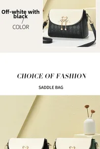 Close-up of saddle bag with swan metal clasp, faux pearl charm and quilted texture